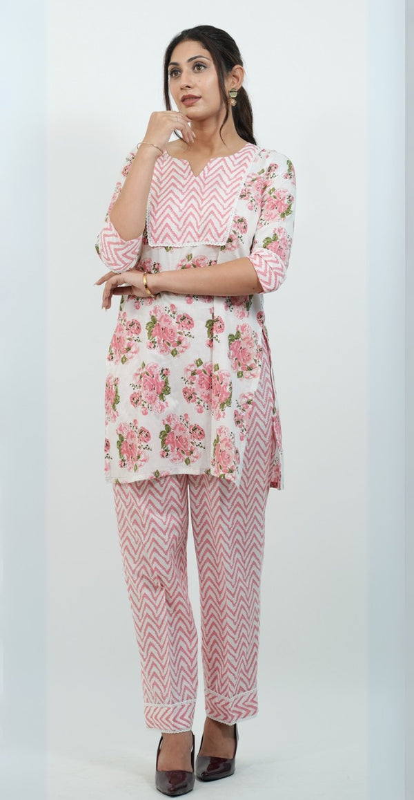 Pink and white floral print co-ord set by SARALATA, featuring a comfortable casual outfit with matching top and pants.